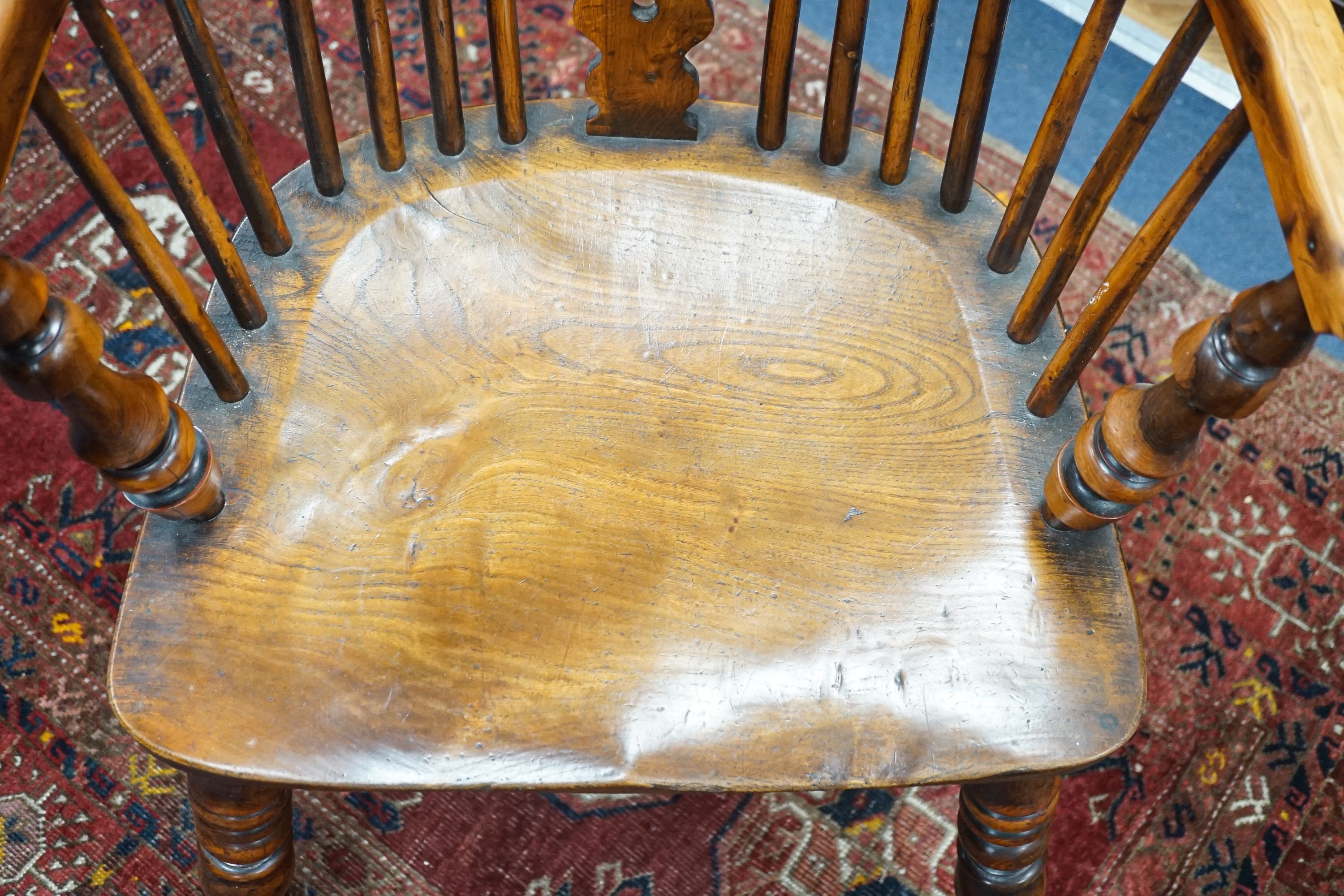 A 19th century Yorkshire area yew and elm Windsor elbow chair with H stretcher, width 58cm, depth 39cm, height 93cm